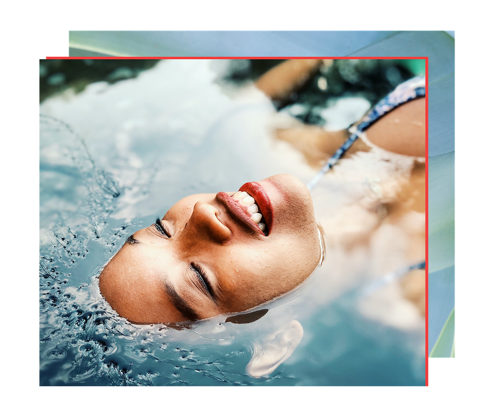 Woman floating relaxing in water